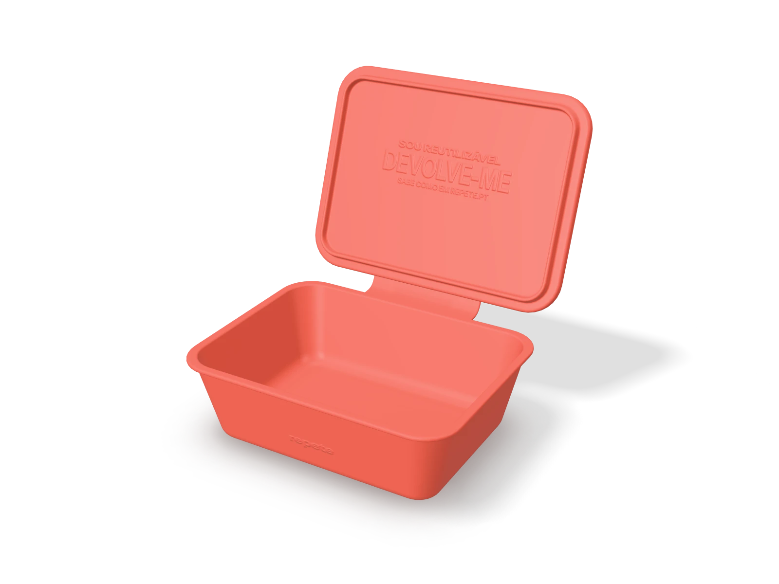 Caja reutilizable de Repete en silicona coral, con la tapa abierta y el mensaje «Soy reutilizable, devuélveme»